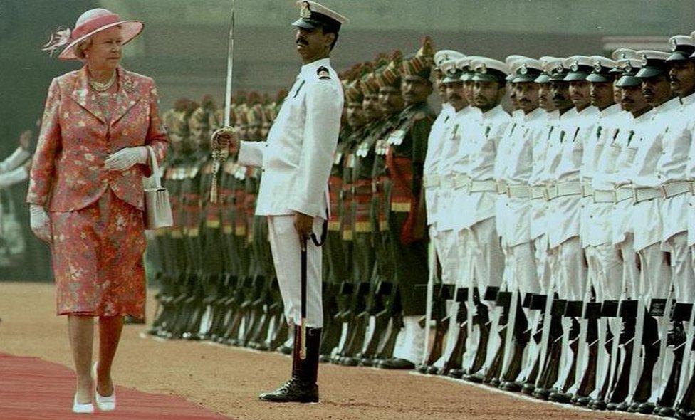 Queen Elizabeth II inspecting an Indian Forces' Honour guard at the Rashtrapati Bhavan (formerly the Viceroy's Palace and Secretariat) in the centre of New Delhi, India, in a visit that marked the 50th anniversary of the country's independence from Britain