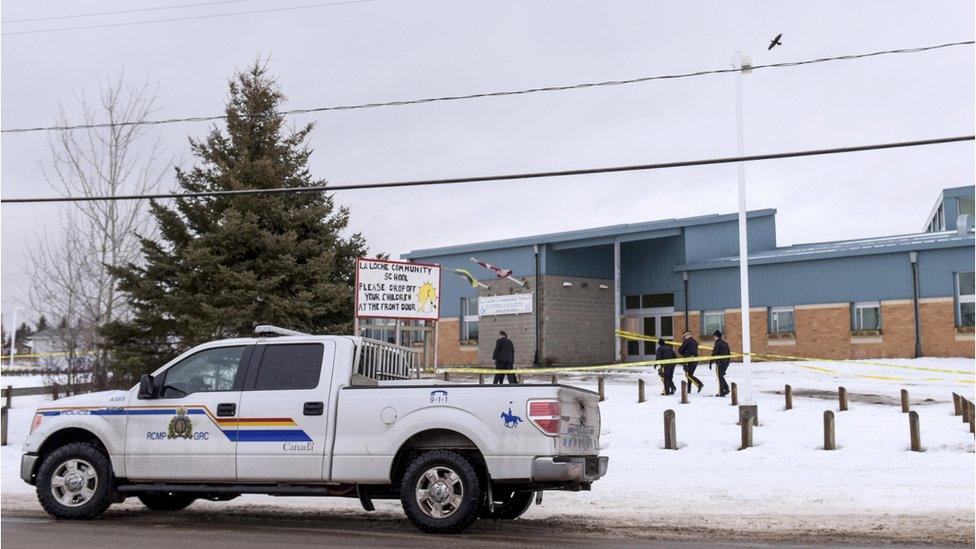 An RCMP vehicle outside the school where the shooting took place in January 2016