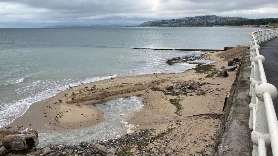 Sea wall where the sand will be deposited