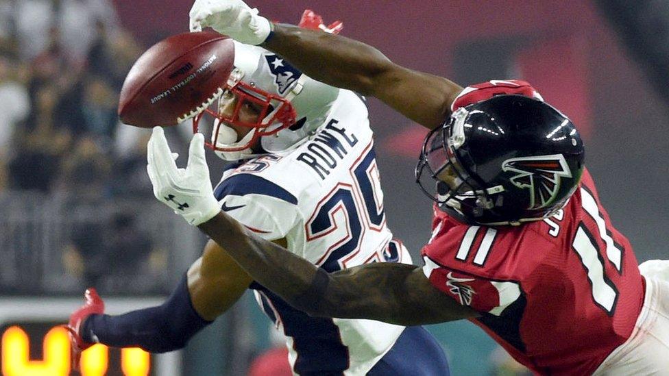 Julio Jones #11 of the Atlanta Falcons makes a catch over Eric Rowe #25 of the New England Patriots during the fourth quarter during Super Bowl 51 at NRG Stadium on February 5, 201