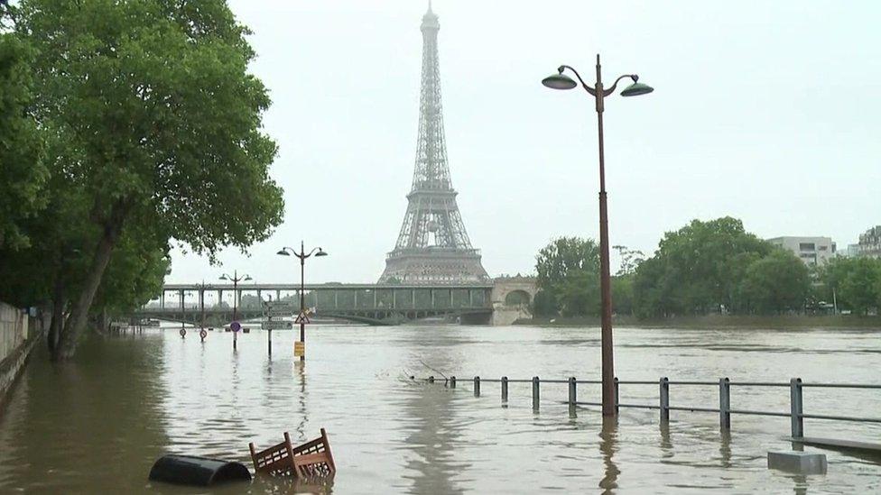 Image of river Seine at high levels with Eiffel Tower in distance - 4 June 2016