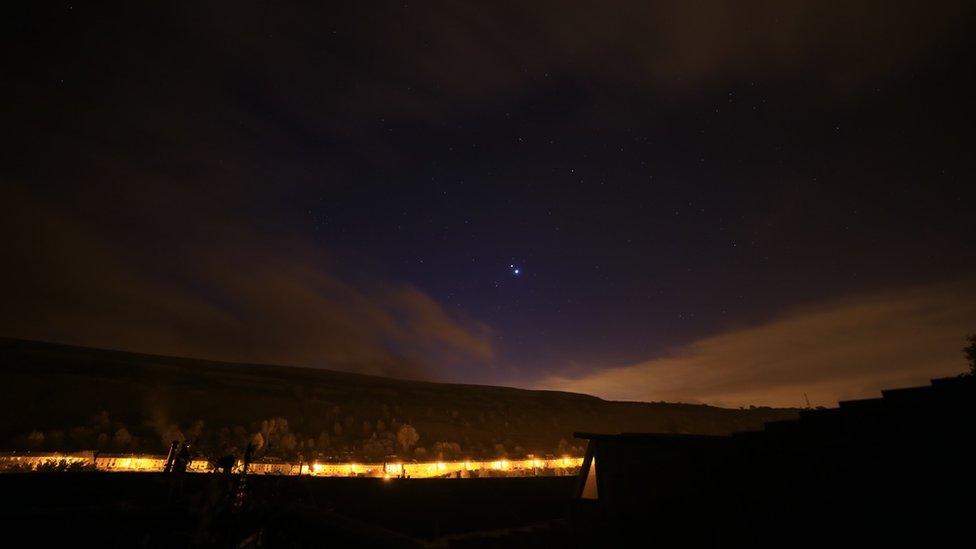 The planets seen from Rhonda in Wales L-R: Mars, bottom left, Jupiter and Venus