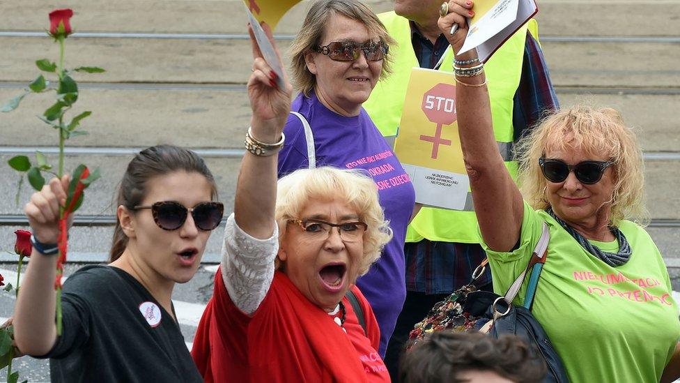 Pro-choice campaigners march on June 18, 2016, in Warsaw, Poland