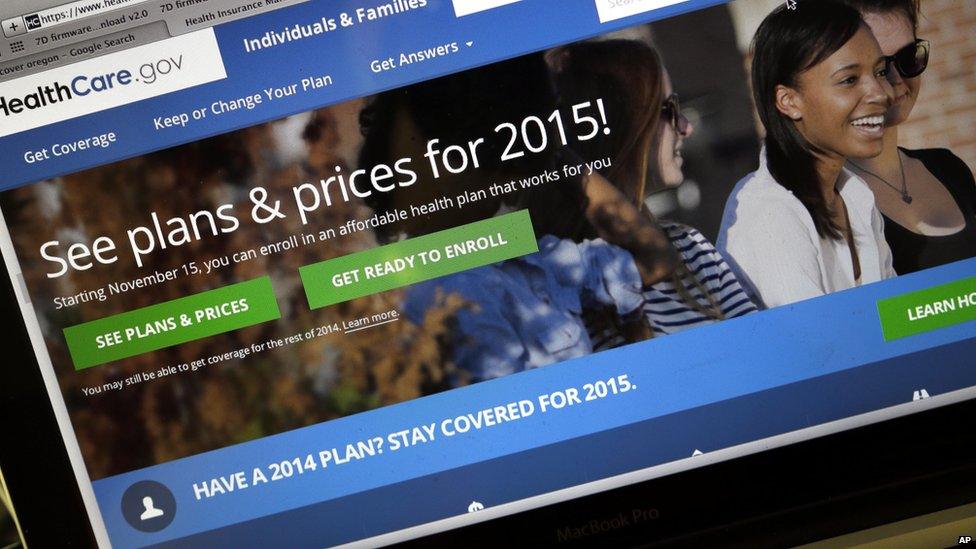 this Nov. 12, 2014 file photo, the HealthCare.gov website, where people can buy health insurance, is displayed on a laptop screen, in Portland, Ore.