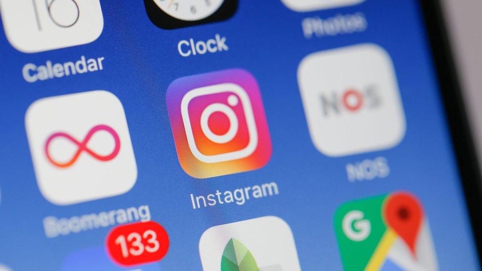 Instagram logo on a screen