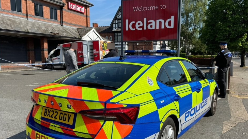 Police at the scene in Narborough Road