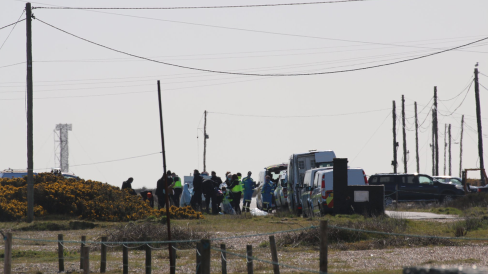 Migrants on Dungeness beach