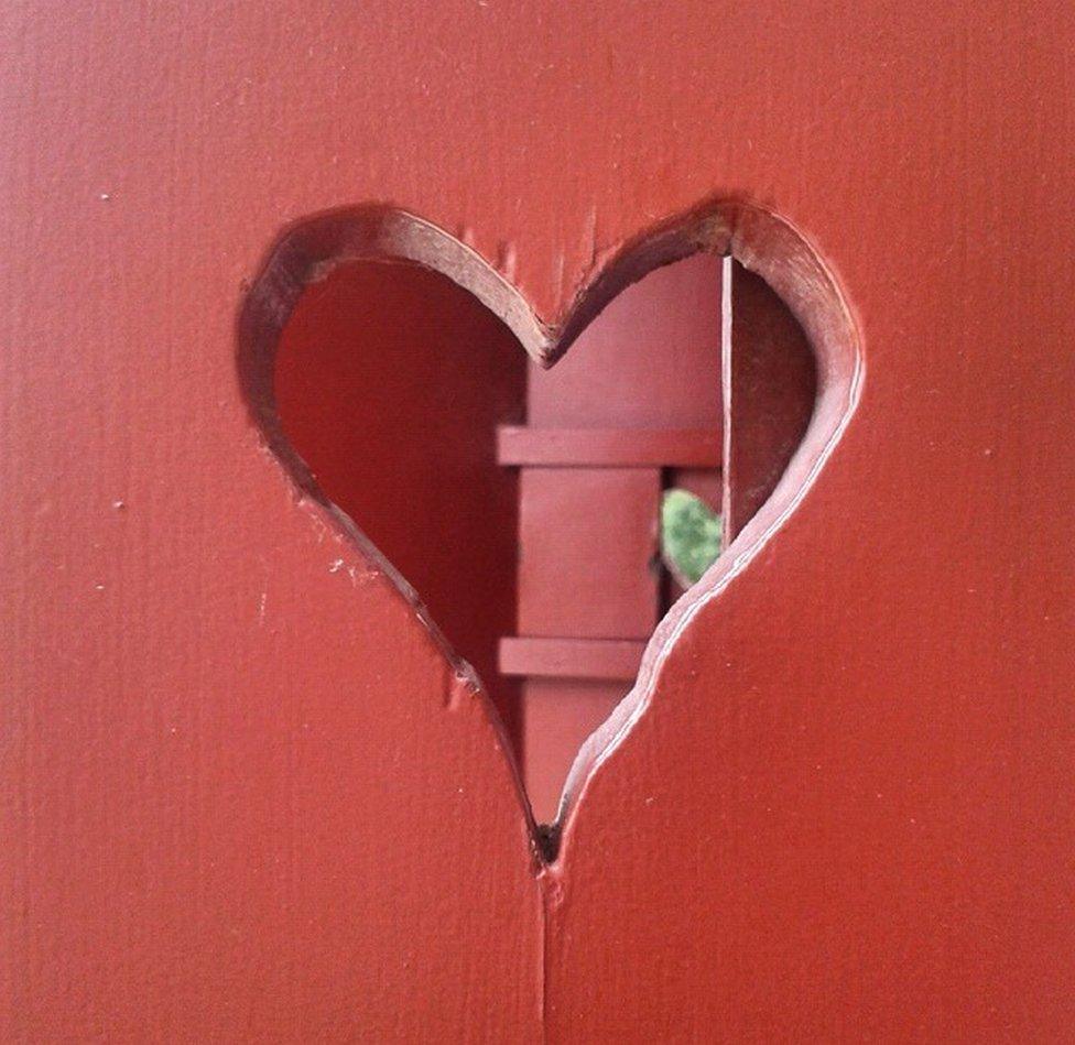 A heart carved in wood