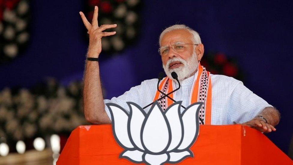 India"s Prime Minister Narendra Modi addresses an election campaign rally in Junagadh, Gujarat, India,