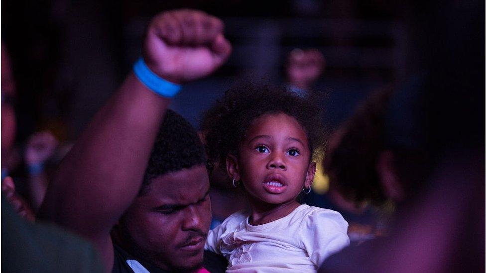 Families listening to Lift Every Voice