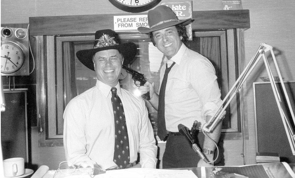 Larry Hagman (left) with Sir Terry Wogan during his Radio 2 Breakfast Show in September 1980