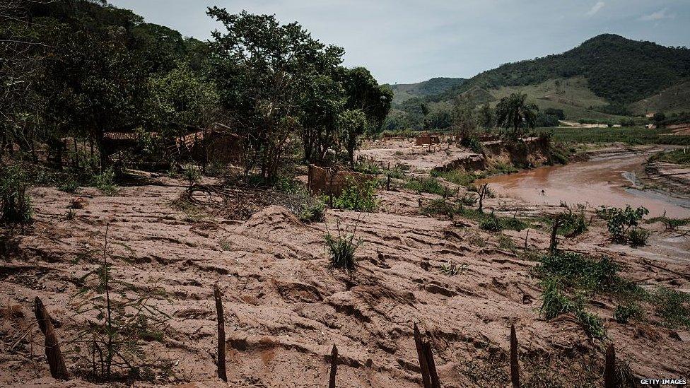 Remains of houses damaged by the flood following the collapse of the Samarco iron-ore mine dam.