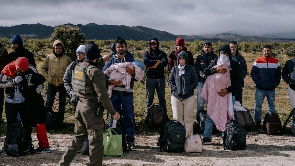 US Border Patrol agents prepare to transport migrants for asylum claim processing at the US-Mexico border in Jacumba, California, US, on Friday, April 5, 2024