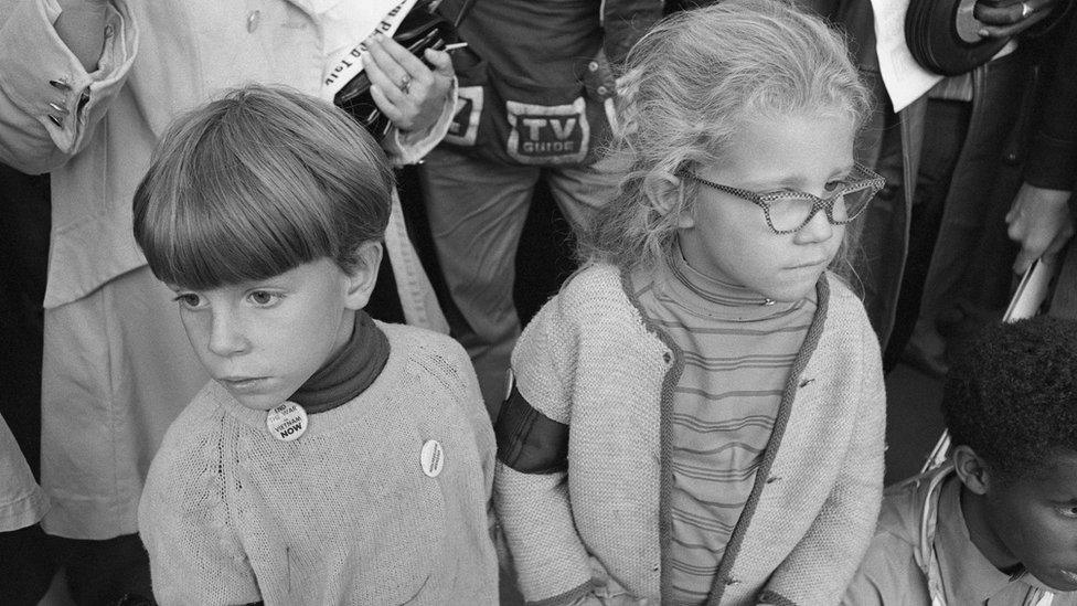 Two children at rally in New York