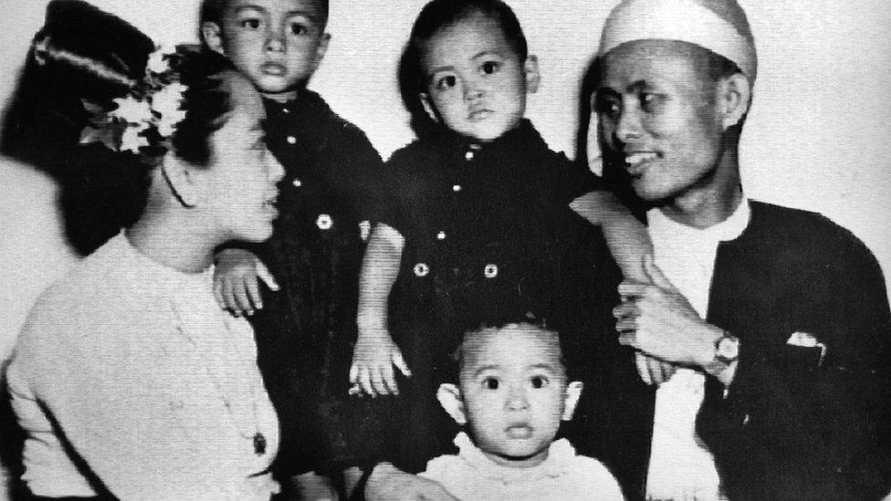 Aung San Suu Kyi (centre) with her parents and two brothers in an image from 1947