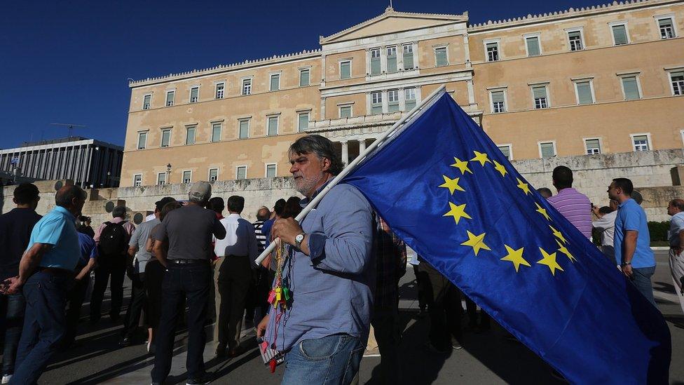 Protesters take part in an anti-government rally organised by the "Resign!" movement, outside the parliament in Athens, Greece, 15 June 2016