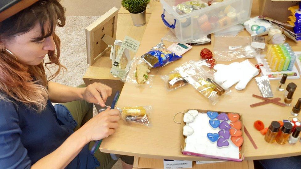 Volunteer packing a bag