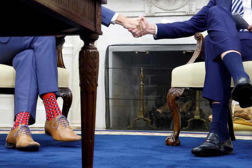 Trudeau and Biden - view from under the desk