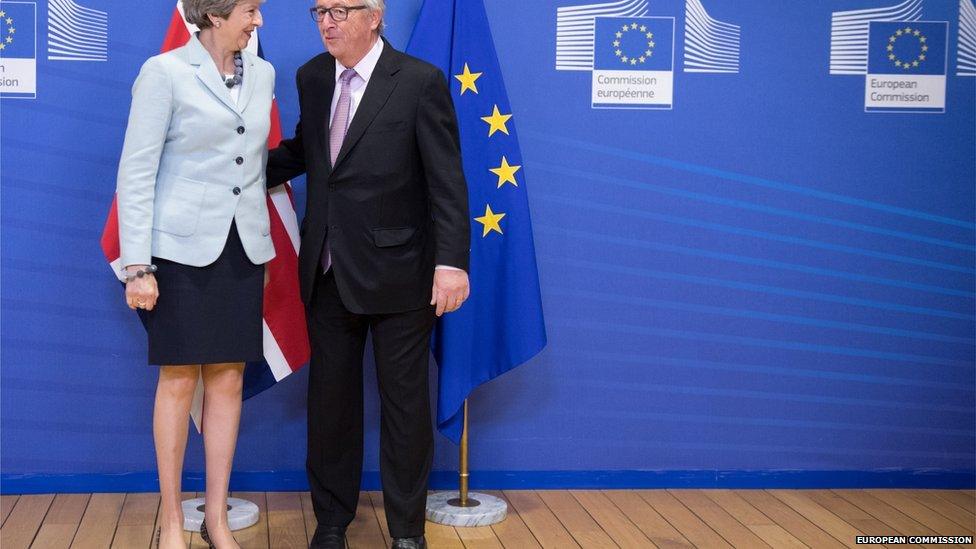 Theresa May with Jean Claude Junker