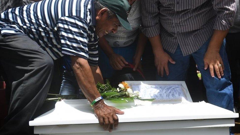 Relatives of 15-month-old Teiler Lorio, who died during an attack by riot police and members of the Sandinista Youth, cries during her son's funeral at the Milagro de Dios cemetery in Managua on June 24, 2018.