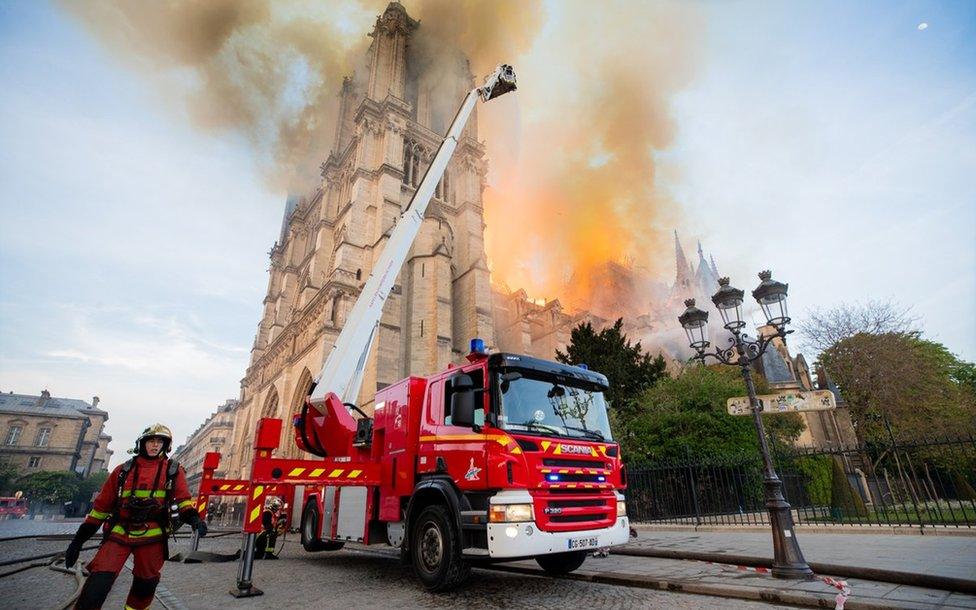 French firefighters at the scene of the fire at Notre Dame cathedral in Paris