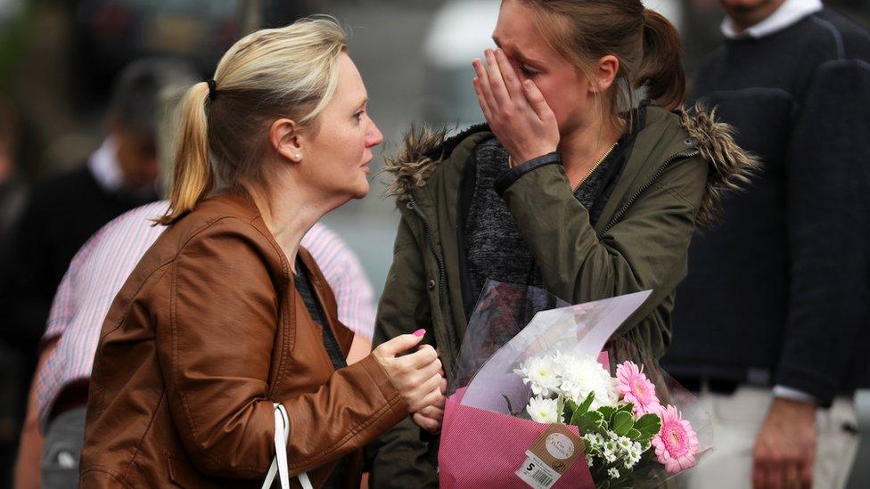 People at scene of tributes in Birstall