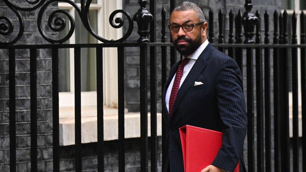 james cleverly walking down downing street