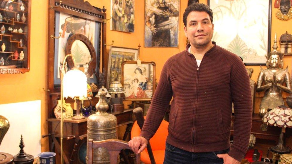 Mohsen Souli in his antiques shop in Finnieston