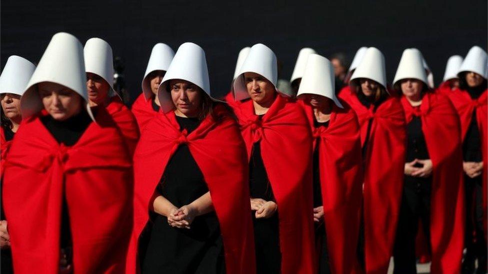 Activists dressed up as characters from "The Handmaid's Tale" take part in a demonstration in favour of legalising abortion in Buenos Aires, Argentina, August 5, 2018