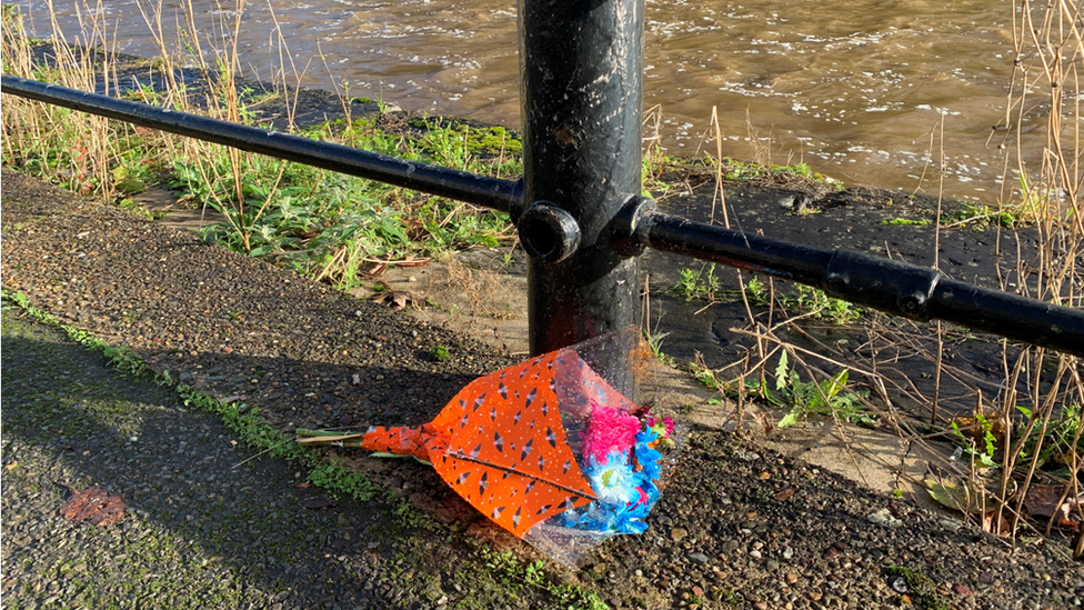 Floral tribute at riverside