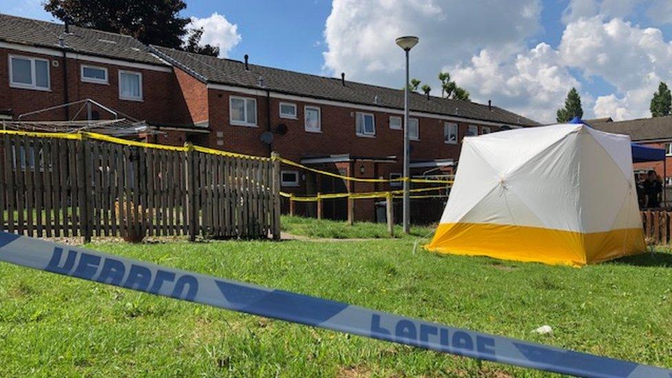 Police tent outside of house in Wrexham