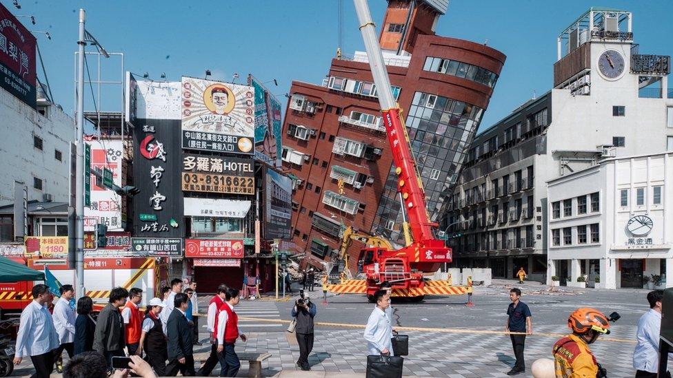 Taiwan President-elect Lai Ching-te inspects the damage following the earthquake, in Hualien