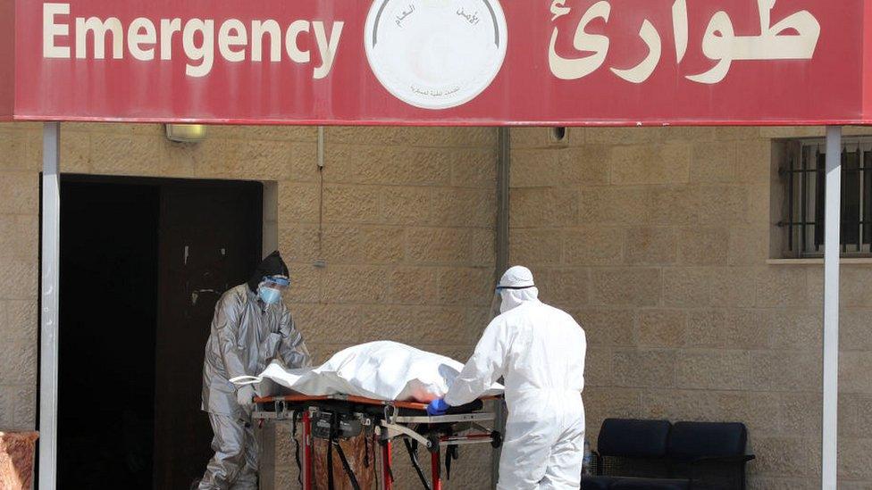 Body being wheeled into a hospital in Nablus