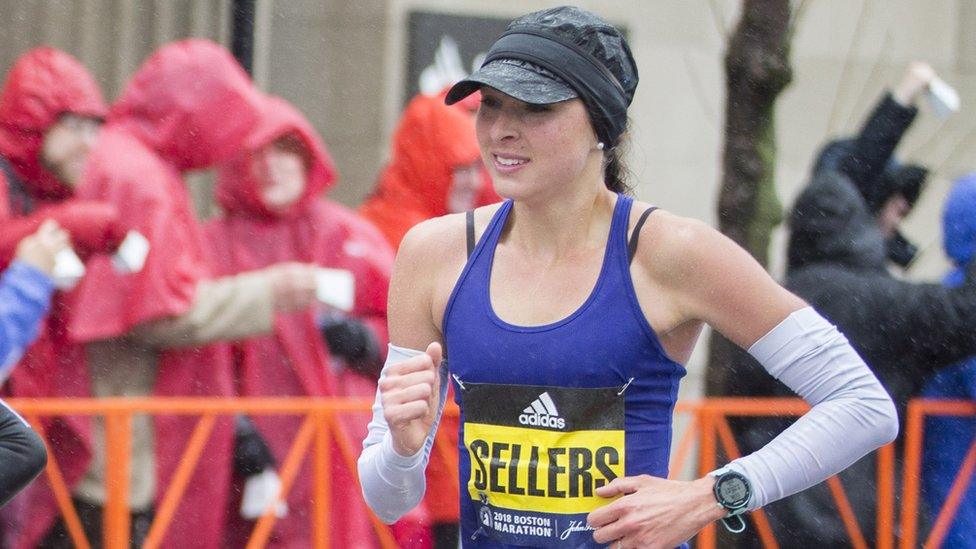 Cropped waist-up shot of Sellers running the race