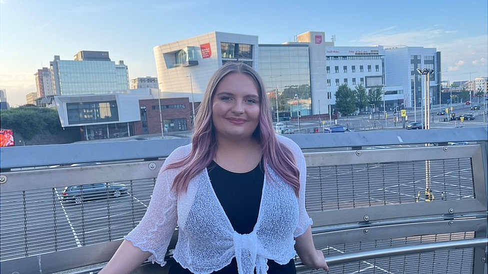 Danielle Herbert outside a university building