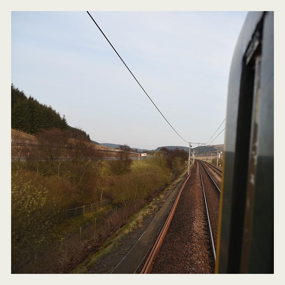 Heather Waugh driving her locomotive alongside the M74 Motorway