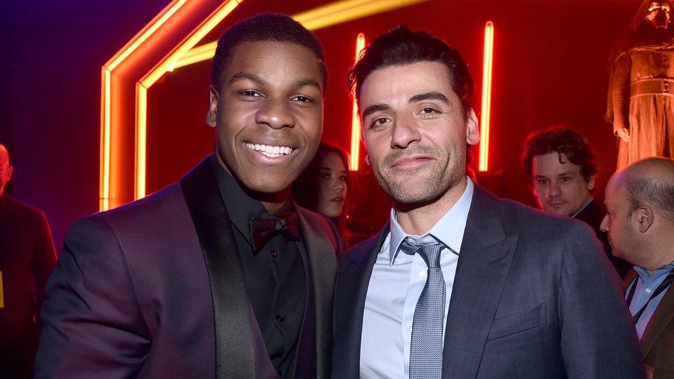 Actors John Boyega (L) and Oscar Isaac attend the after party for the World Premiere of Â"Star Wars: The Force Awakens