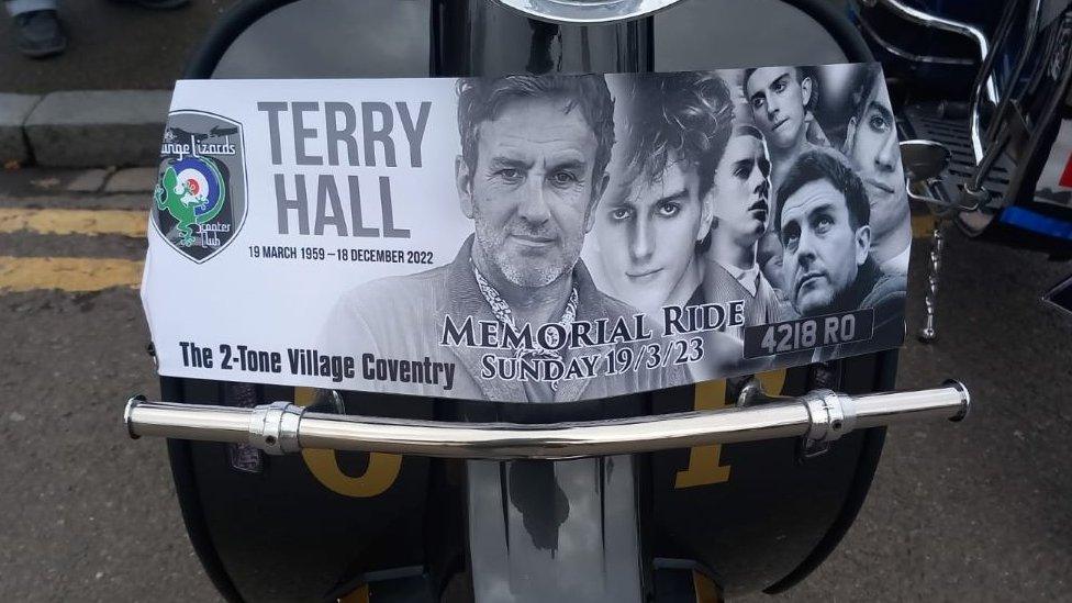 Scooter with Terry Hall sign