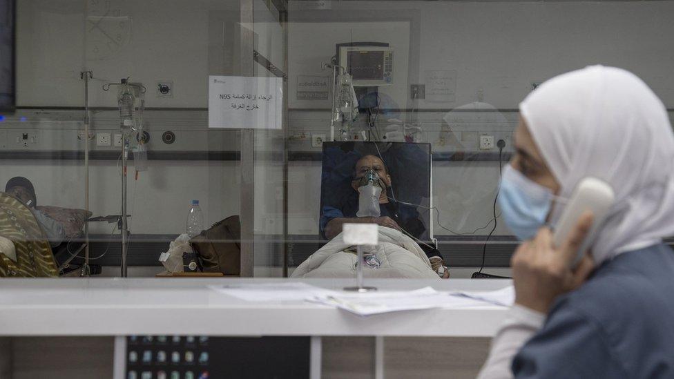 Healthcare staff and nurses watch over Covid-19 patients in an intensive care unit at Rafik Hariri University Hospital in Beirut, Lebanon (7 January 2021)