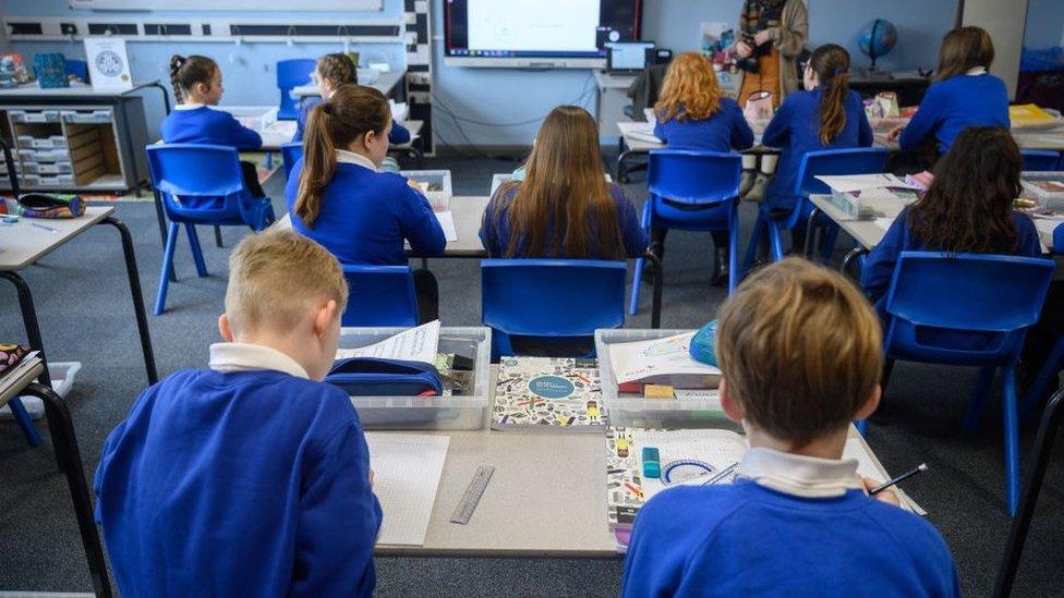 Year six students listen to their teacher Ishka Trace-Kleeberg as classes return to Gamlingay Village Primary on March 08, 2021 near Bedford