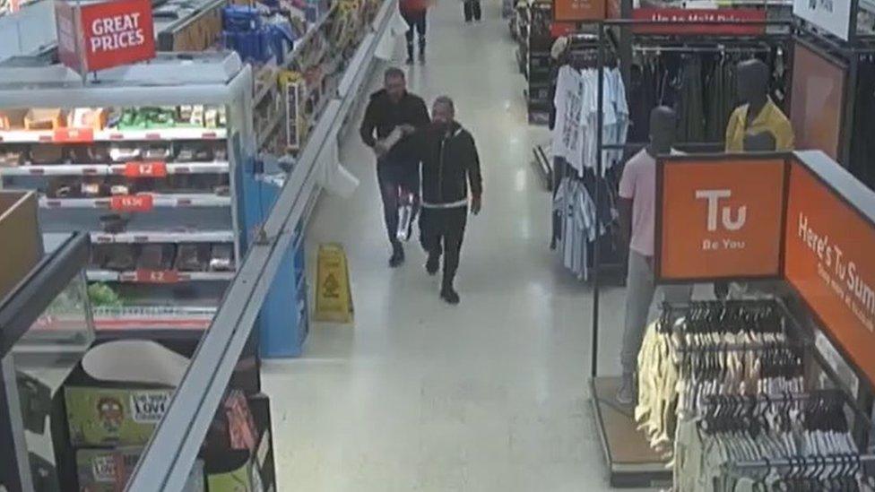 Two men buying knives in Sainsbury's