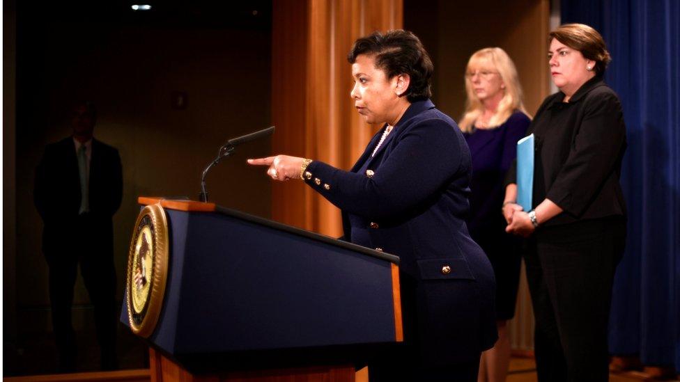 US Attorney General Loretta E Lynch, flanked by US Attorney Eileen M Decker of the Central District of California (centre) and Assistant Attorney General Leslie R Caldwell (right) as she announces the filing of civil forfeiture complaints in Washington, 20 July 2016.