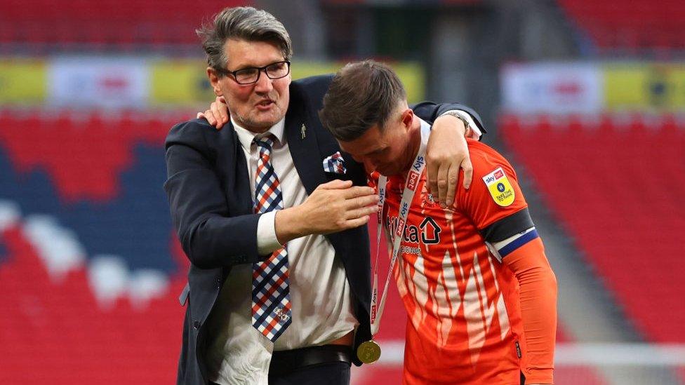 Luton Town's Dan Potts with Mick Harford, a Luton Town legend