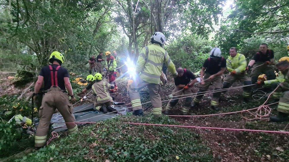 Firefighters and paramedics at the mine shaft in St Blazey