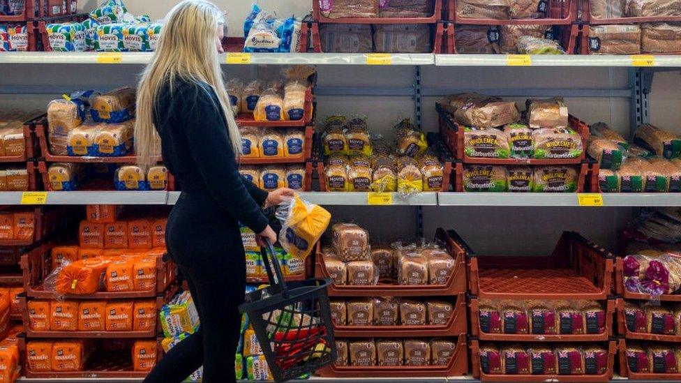 Woman shopping in supermarket