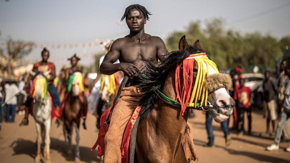 A horseman prepares to parade for the opening ceremony of the FESPACO The Panafrican Film and Television Festival of Ouagadougou, on February 23, 2019