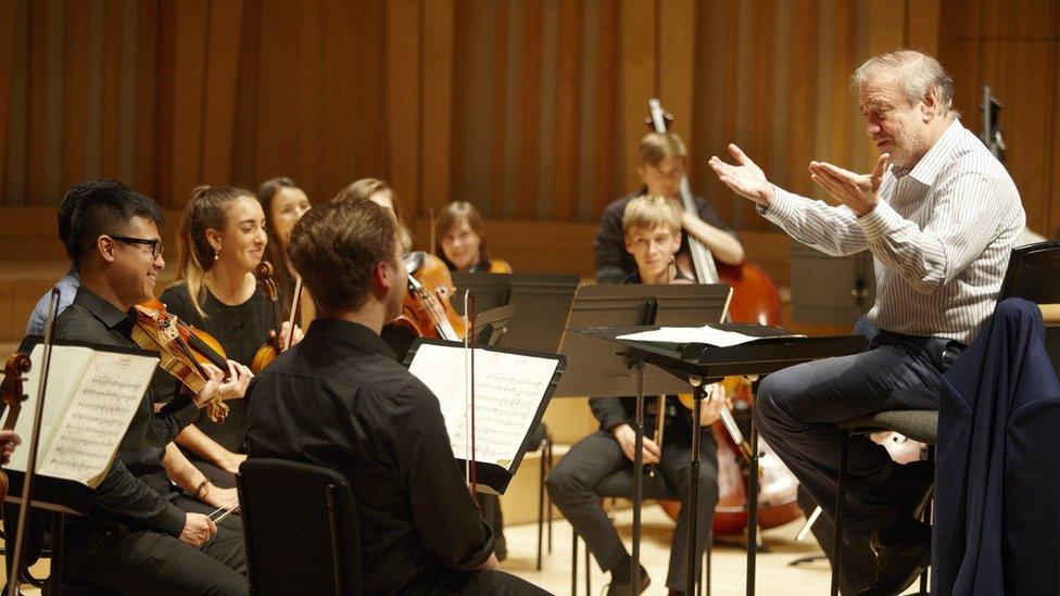 A photo of Valery Gergiev conducting a masterclass