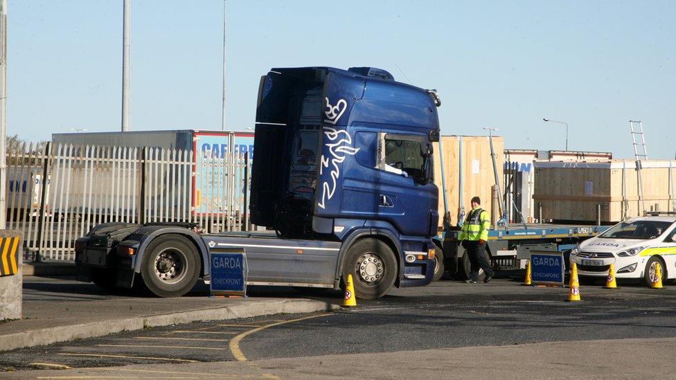 Armed Irish police stop the lorry cab