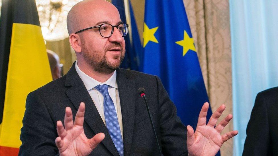 Belgium's Prime Minister Charles Michel gestures as he speaks during a press conference following an emergency meeting of all Belgium federal entities on the EU-Canada Comprehensive Economic and Trade Agreement (CETA) in Brussels on 24 October 2016.