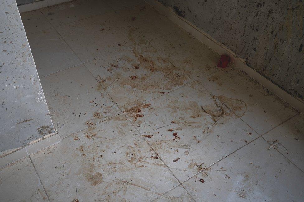 Blood on the floor of the house. Abdellatif's cousin Jihad Abu Aliya was shot dead on the property during the attack.